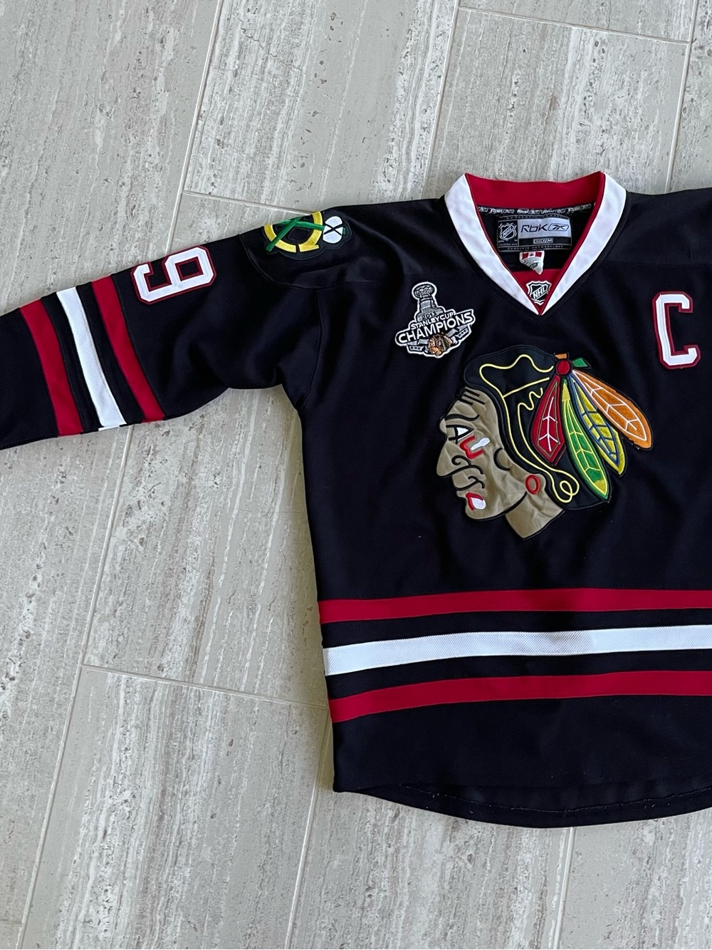 Reebok Black Chicago-Style Hockey Jersey with Red & White Striping